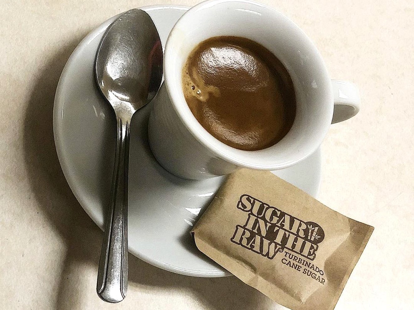 Italian espresso in white cup with saucer at Four Seasons Ice Cream Elmwood Park